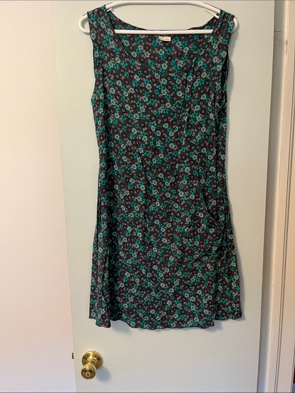 Sleeveless Black Mini Dress with Teal Floral Print
